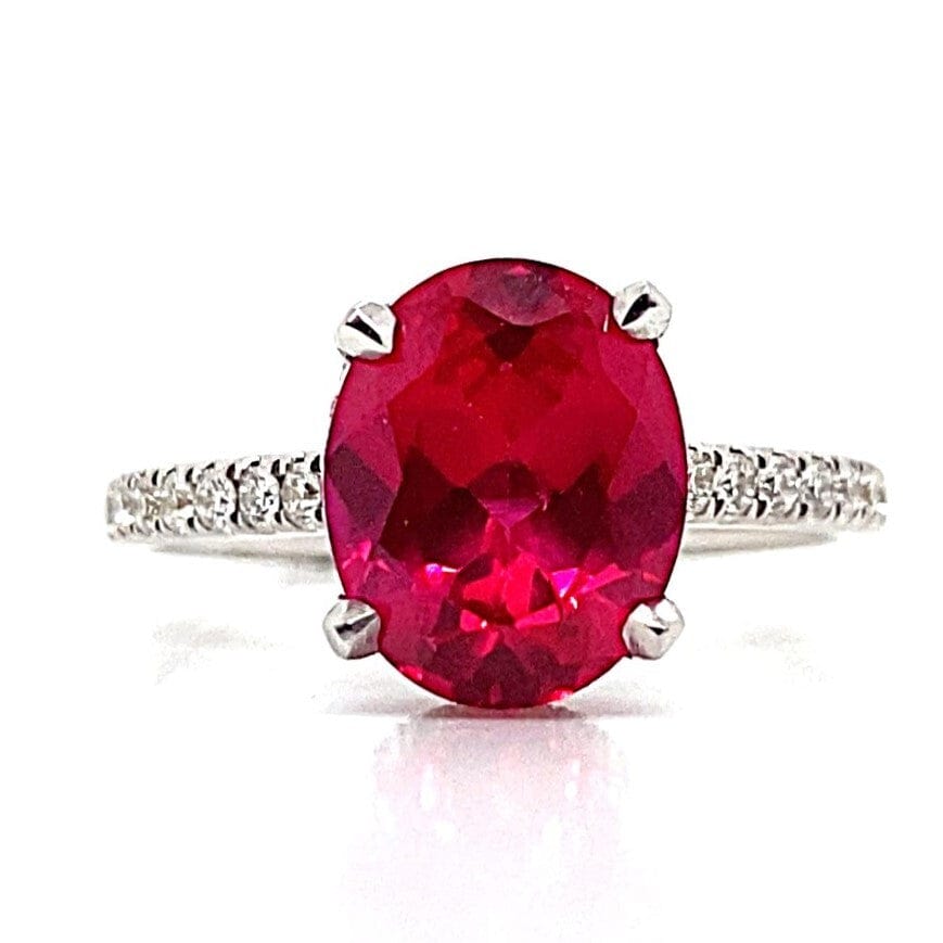 18K WHITE GOLD 10X8 MM LAB GROWN OVAL RUBY CENTER  .47 CT TW NATURAL ROUND BRILLIANT DIAMOND ACCENT RING