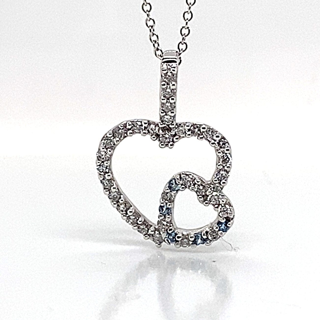 14K WHITE GOLD 1/2 CT TW NATURAL ROUND BRILLIANT DIAMOND AND AQUA MARINE ACCENT DOUBLE HEART STYLE PENDANT WITH CHAIN