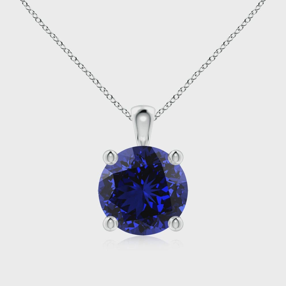 14K WHITE GOLD 12 MM ROUND BRILLIANT LAB GROWN BLUE SAPPHIRE .35 CT TW NATURAL ROUND BRILLIANT DIAMOND HALO STYLE WITH THREE STRAND CHAIN