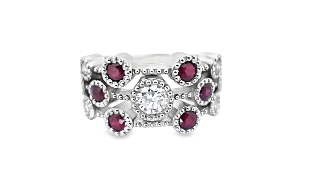 14KW .90CTW DIAMOND & .60CTW RUBY BEZEL STYLE RING