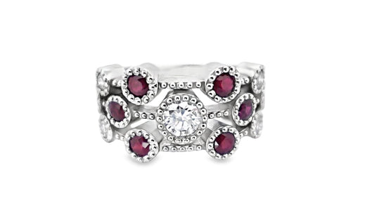 14KW .90CTW DIAMOND & .60CTW RUBY BEZEL STYLE RING