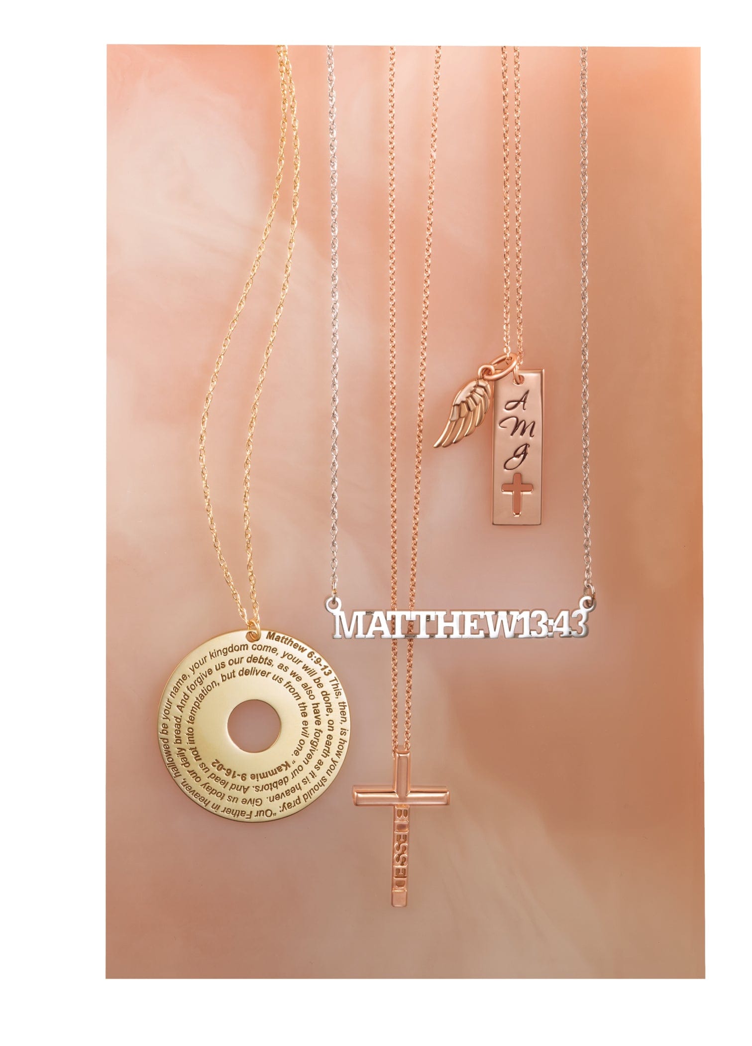 Three necklaces with religious pendants: a prayer disc, a cross, a Matthew 13:43 bar, and an angel wing charm.