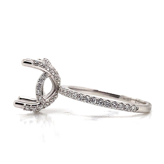 This stunning 14K white gold ring showcases a twisted band adorned with lab-grown accent diamonds and a hidden halo, offering an empty prong setting for a customizable center stone.