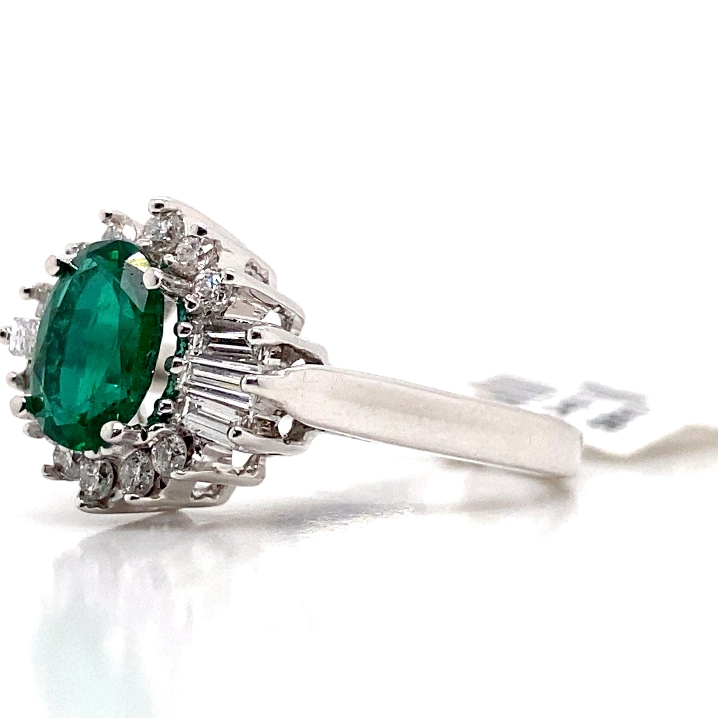 aster jewels 18k white gold   1.03 ct natural emerald center    .22 ct tw natural round brilliant 0.25 ct tw baguette diamond accent   ring