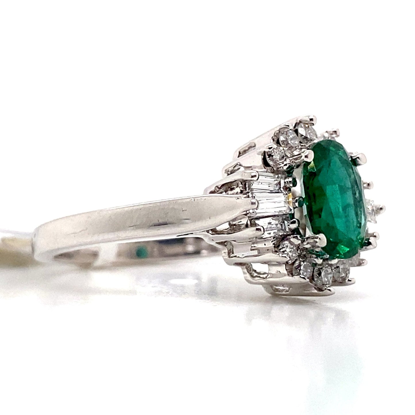 aster jewels 18k white gold   1.03 ct natural emerald center    .22 ct tw natural round brilliant 0.25 ct tw baguette diamond accent   ring