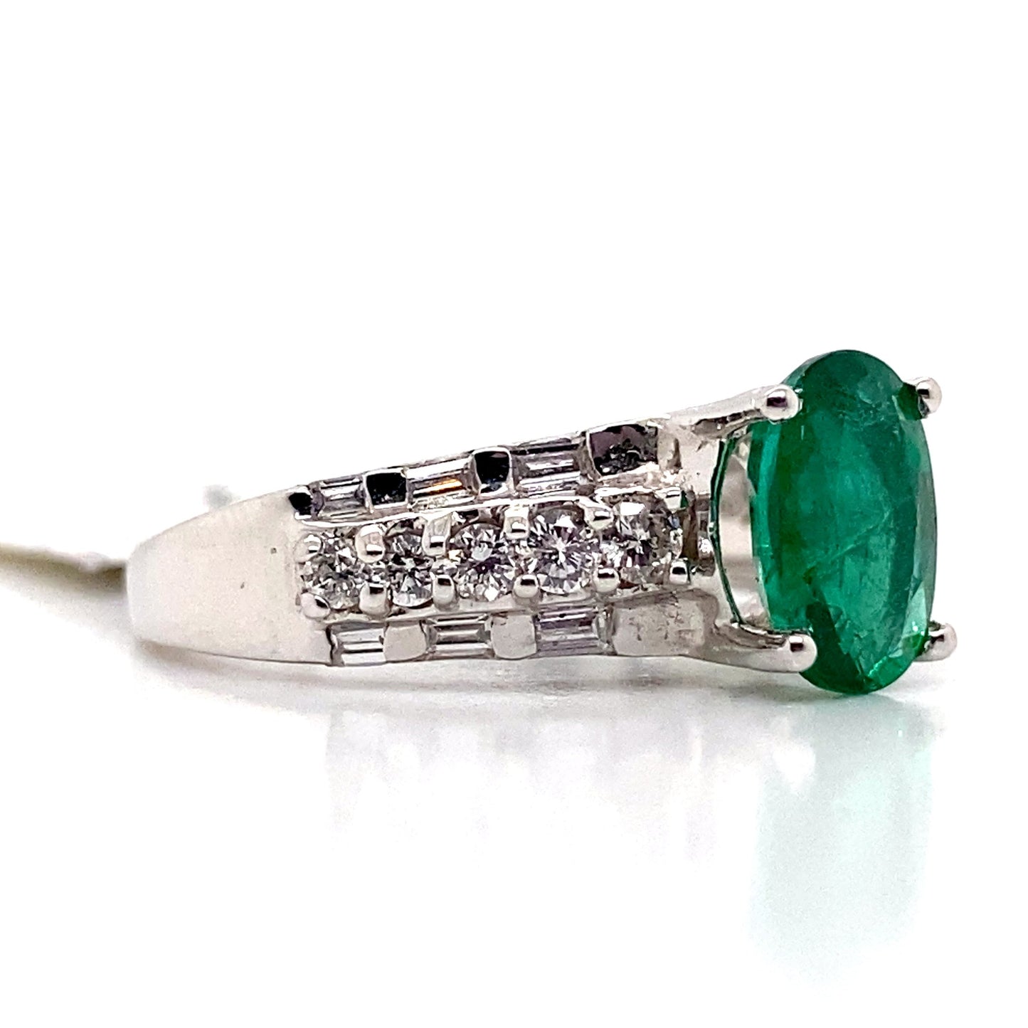 aster jewels 14k white gold   1.44 ct natural emerald center    .36 ct tw natural round brilliant   fashion ring