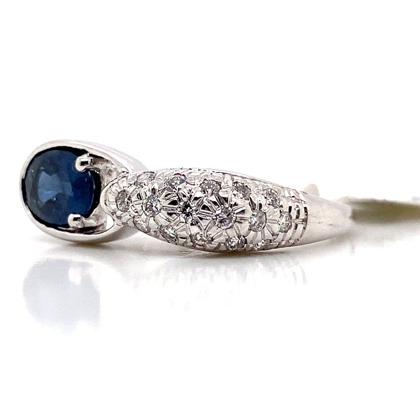 aster jewels 18k white gold   1.10 ct natural blue sapphire     .20 ct tw natural diamond    fashion ring