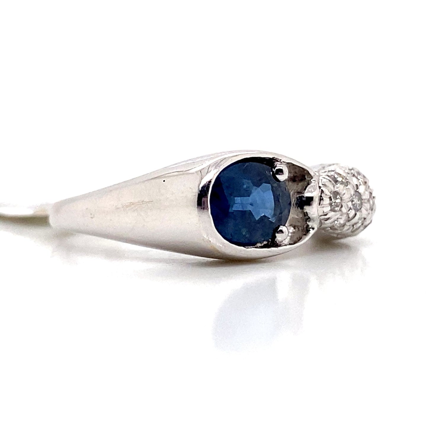 aster jewels 18k white gold   1.10 ct natural blue sapphire     .20 ct tw natural diamond    fashion ring