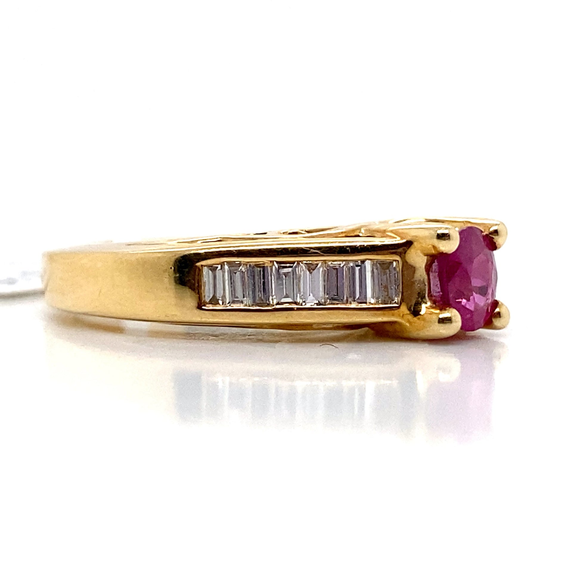 ASTER JEWELS 14K YELLOW GOLD   .42 CT NATURAL RUBY  .05 CT TWD ROUND BRILLIANT AND .37 CT TW BAGUETTE DIAMOND ACCENT  FASHION RING