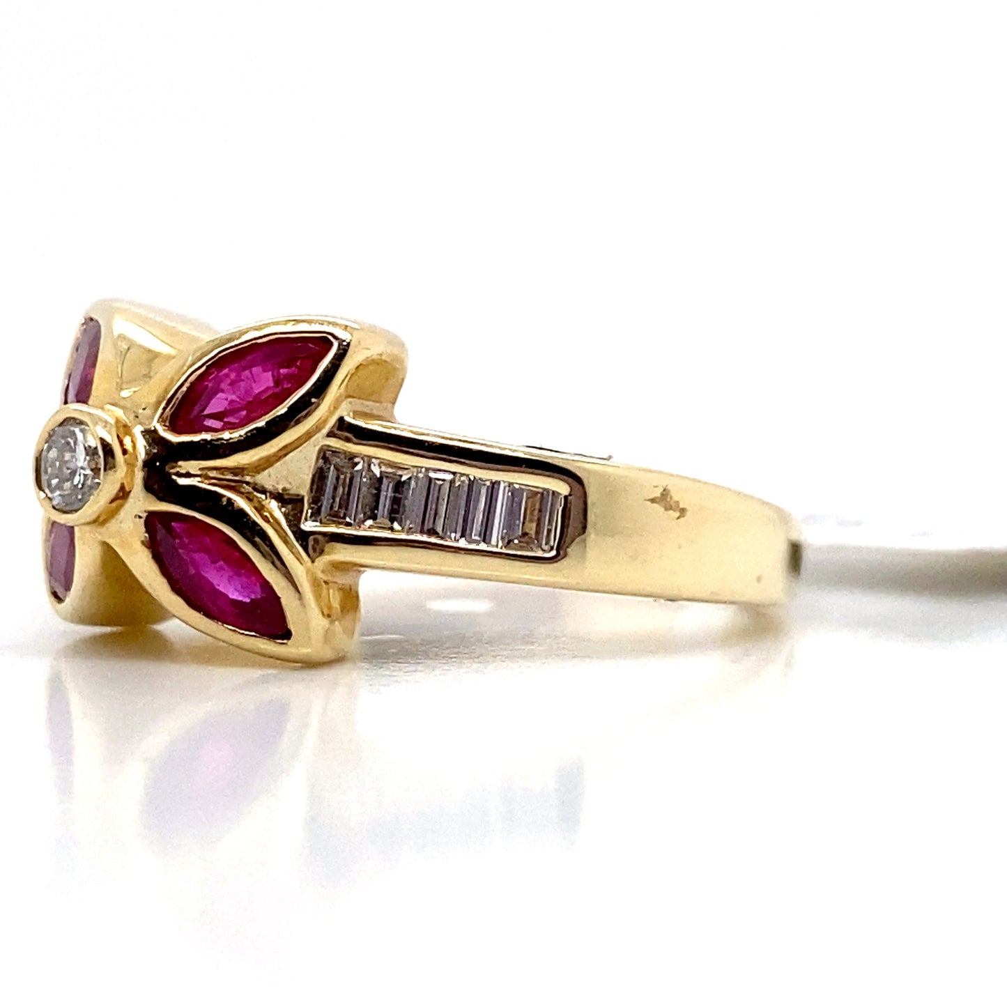 aster jewels 14k yellow gold   .81 ct tw natural ruby accent   .35 ct tw natural baguette diamond accent   fashion ring