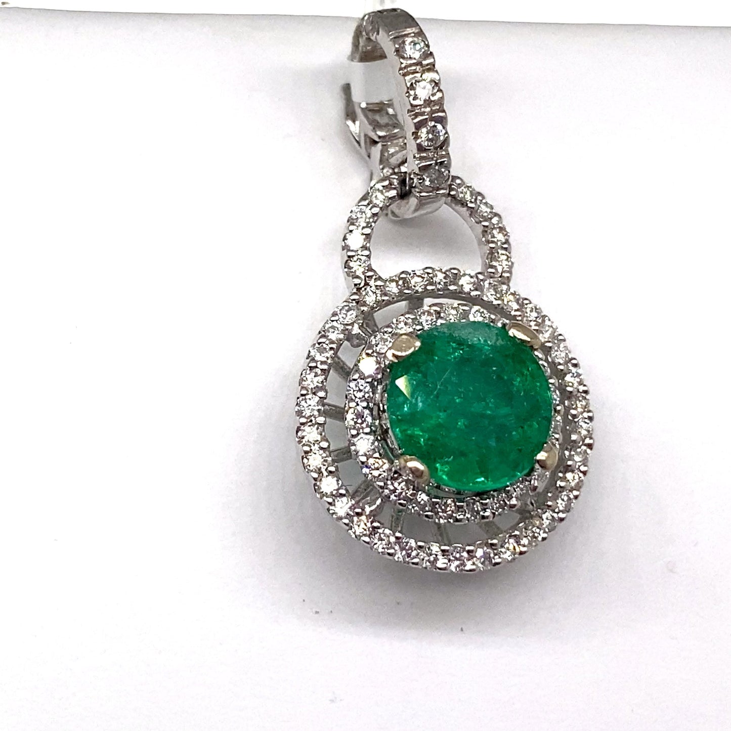 aster jewels 14k white gold     1.34 ct natural emerald center    .35 ct tw round brilliant natural diamond accent   pendant