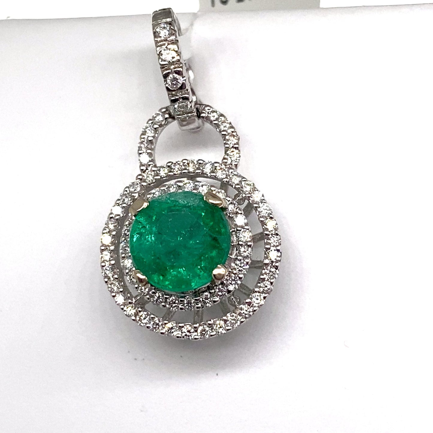 aster jewels 14k white gold     1.34 ct natural emerald center    .35 ct tw round brilliant natural diamond accent   pendant