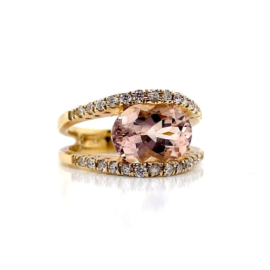 14K white gold ring featuring a stunning 2.75 carat oval-cut Morganite gemstone, accented by 0.39 total weight natural diamonds on the band.