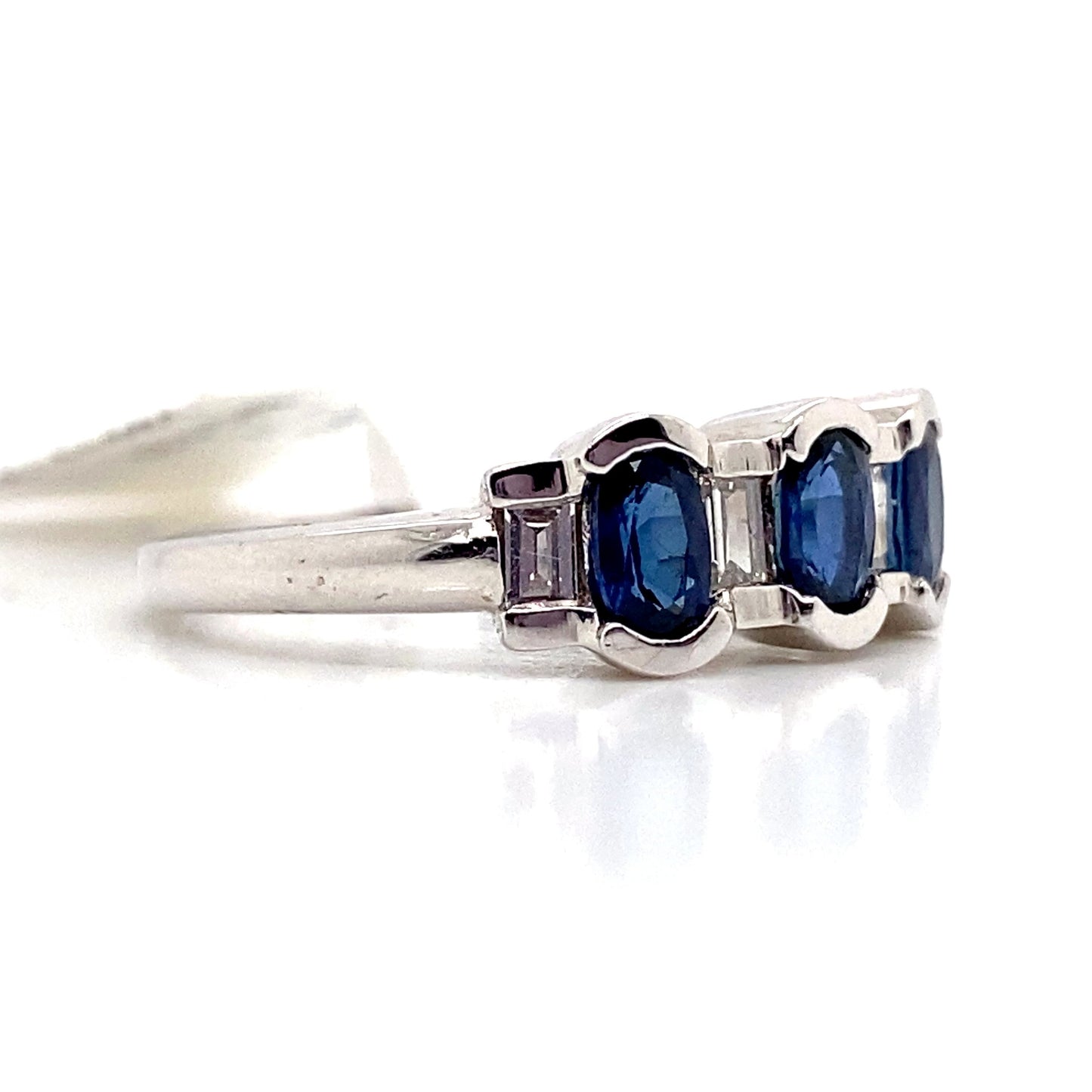 aster jewels 14k white gold   1.04 ct tw natural blue sapphire   .23 ct tw natural baguette diamond accent  fashion ring