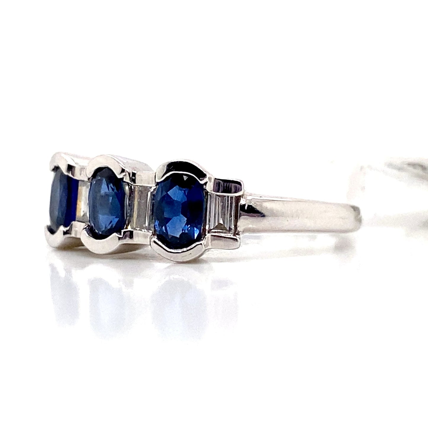 aster jewels 14k white gold   1.04 ct tw natural blue sapphire   .23 ct tw natural baguette diamond accent  fashion ring