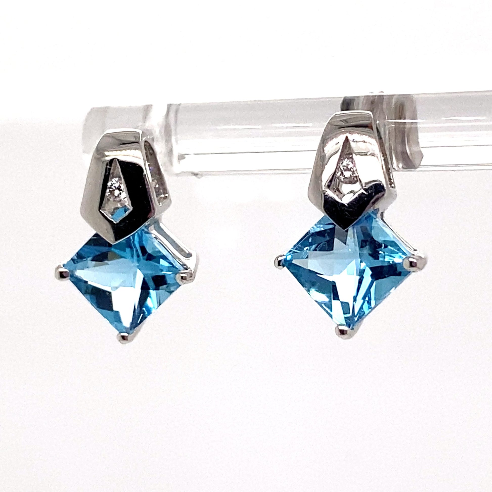 LIVINGSTONE JEWELRY 14K WHITE GOLD 2.60 CT TW SWISS BLUE TOPAZ CENTER 0.03 CT TW NATURAL DIAMOND ACCENT EARRINGS