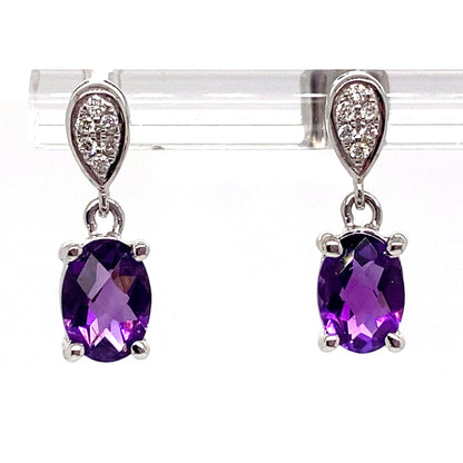 LIVINGSTONE JEWELRY 14K ROSE GOLD 1.70 CT TW AMETHYST CENTER 0.072 CT TW NATURAL DIAMOND ACCENT EARRINGS