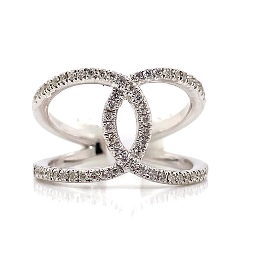 The intricate elegance of this luxury jewelry piece shines through—a 14K white gold fashion ring featuring a double-loop design with natural diamond accents, all set against a pristine white background.