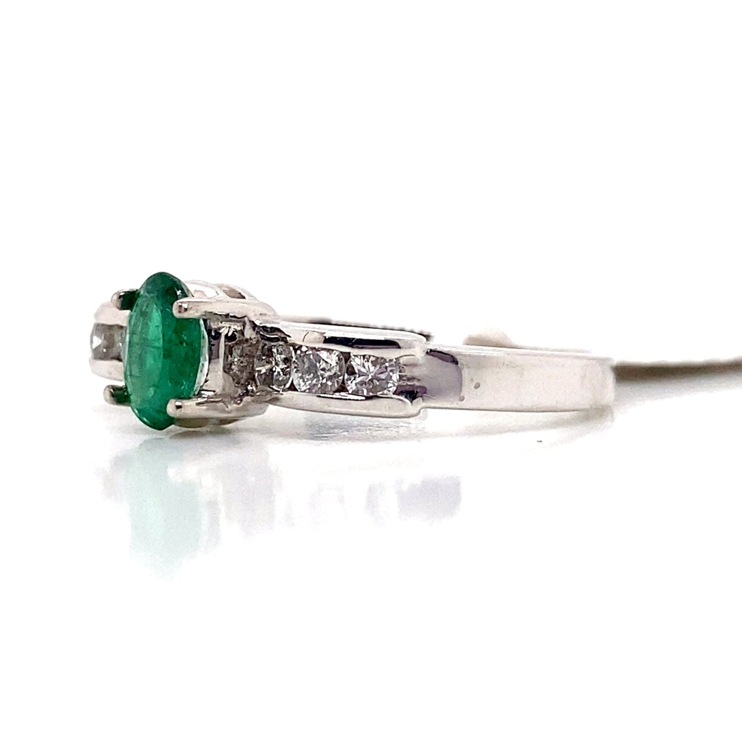 aster jewels 14k white gold    .40 ct natural emerald center       .25 ct tw round brilliant natural diamond accent   fashion ring