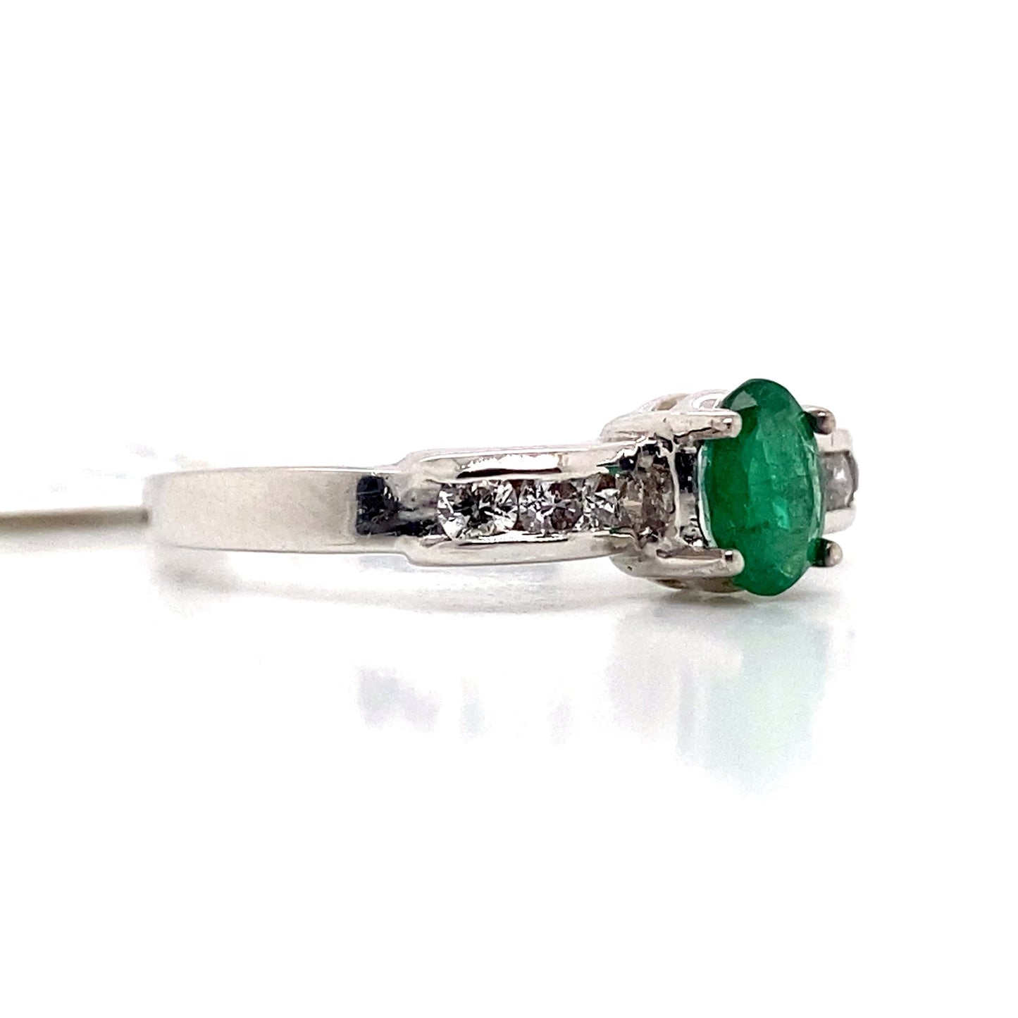 aster jewels 14k white gold    .40 ct natural emerald center       .25 ct tw round brilliant natural diamond accent   fashion ring