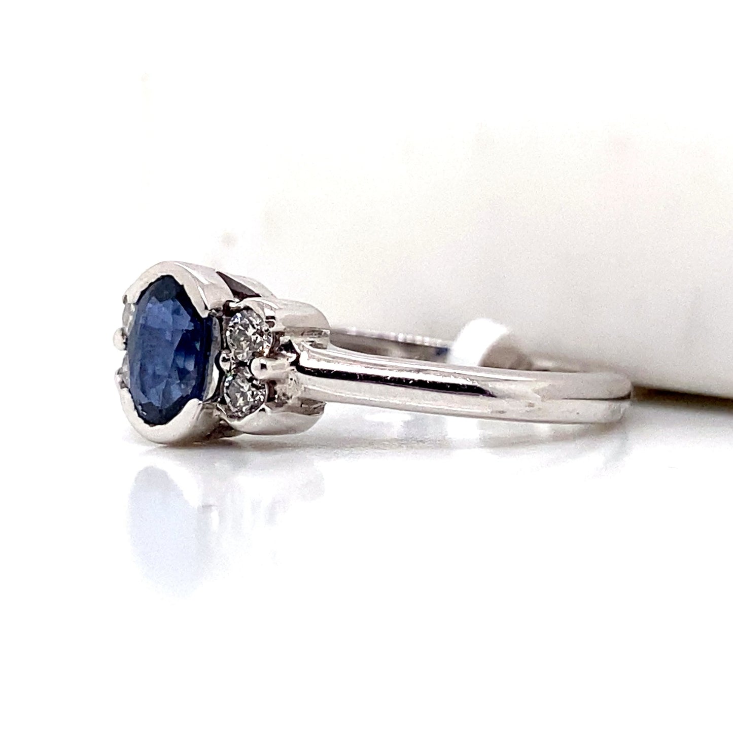 aster jewels 14k white gold   .68 ct natural  blue sapphire center    .12 ct tw round brilliant natural diamond accent   fashion ring