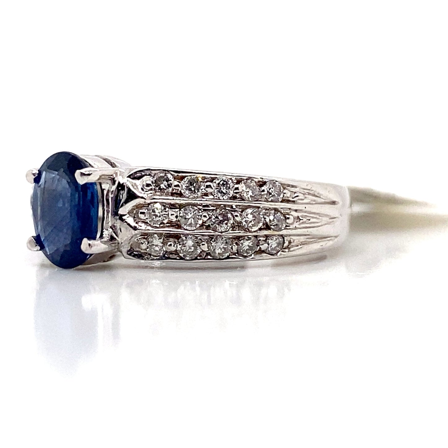 aster jewels 14k white gold   .97 ct natural blue sapphirecenter   .39 ct tw natural round brilliant diamond accent  fashion ring