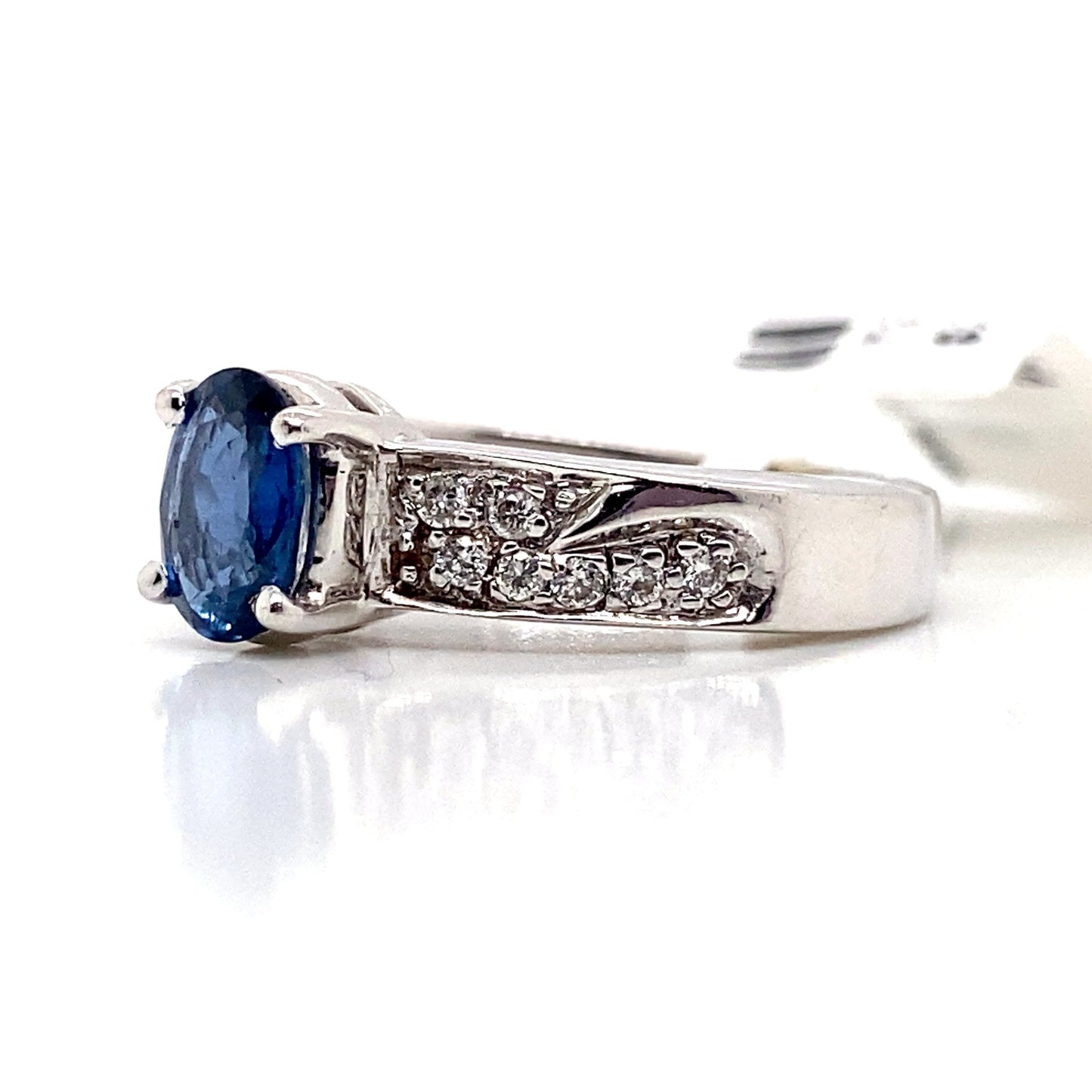 aster jewels 14k white gold    .95 ct blue sapphire center   .14 ct tw round brilliant natural diamond accent  fashion ring