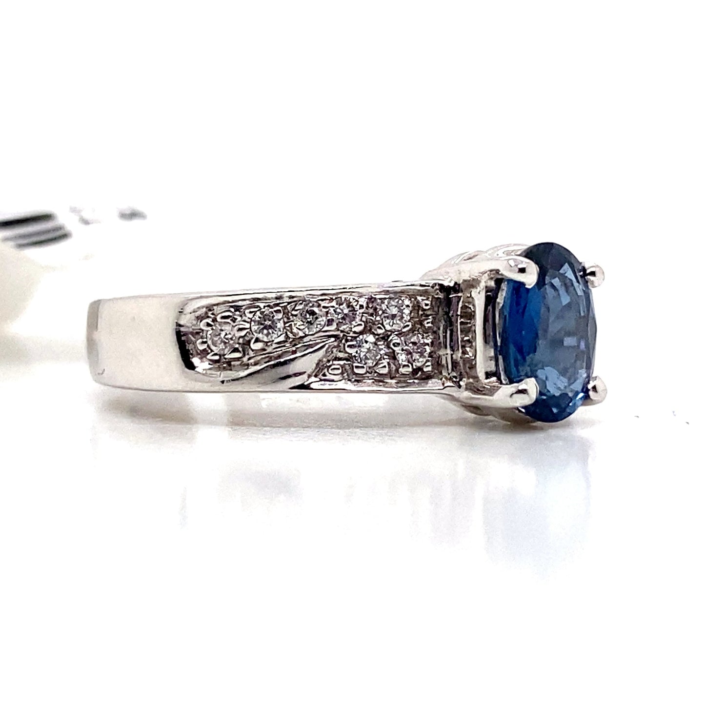 aster jewels 14k white gold    .95 ct blue sapphire center   .14 ct tw round brilliant natural diamond accent  fashion ring