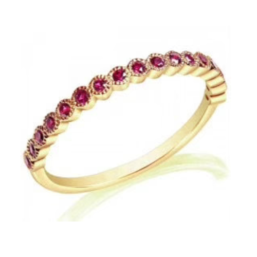 The 14K Yellow Gold .22ct TW Natural Ruby Milgrain Band 17RU is an elegant ring adorned with a series of small, round natural rubies set along its milgrain band.