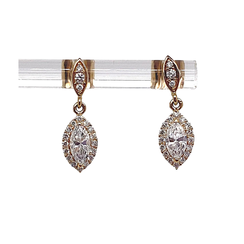 10K Yellow Gold 0.75CT TW Lab Diamond Marquise Halo Dangle Studs, crafted from 10K yellow gold and featuring lab diamond marquise studs with small round accents, elegantly displayed on a clear stand.