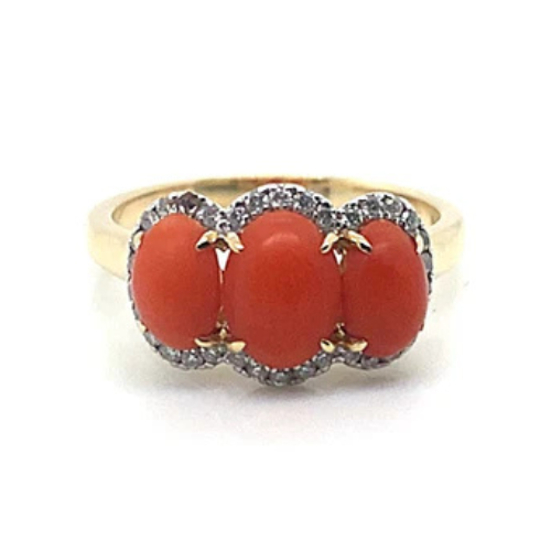 14K Yellow Gold fashion ring showcasing a coral center with two oval cabochon stones, each highlighted by natural diamond accents.