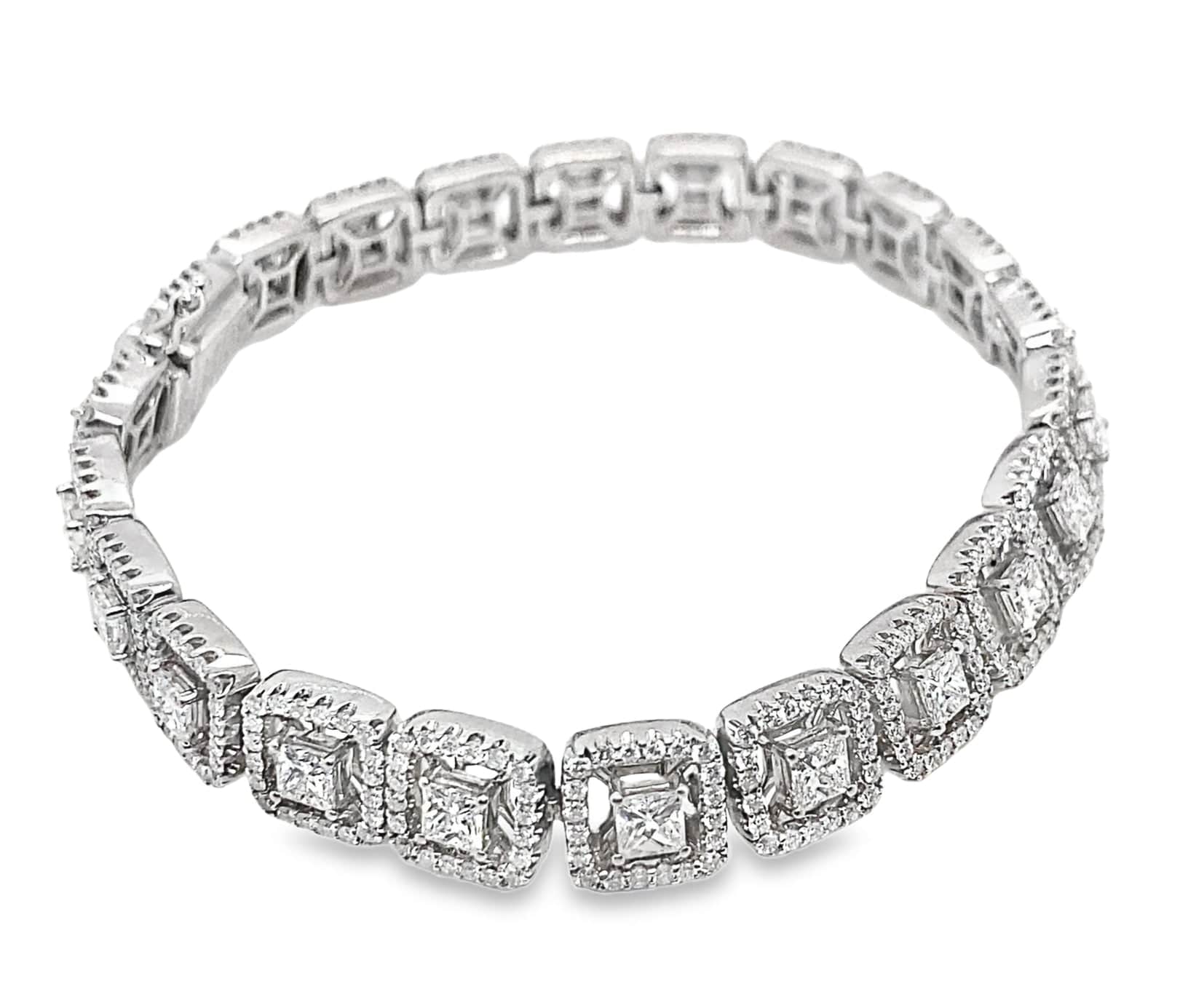 18KW 5.50CTW NATURAL PRINCESS AND ROUND BRILLIANT DIAMOND G-H/SI HALO STYLE TENNIS BRACELET 7"