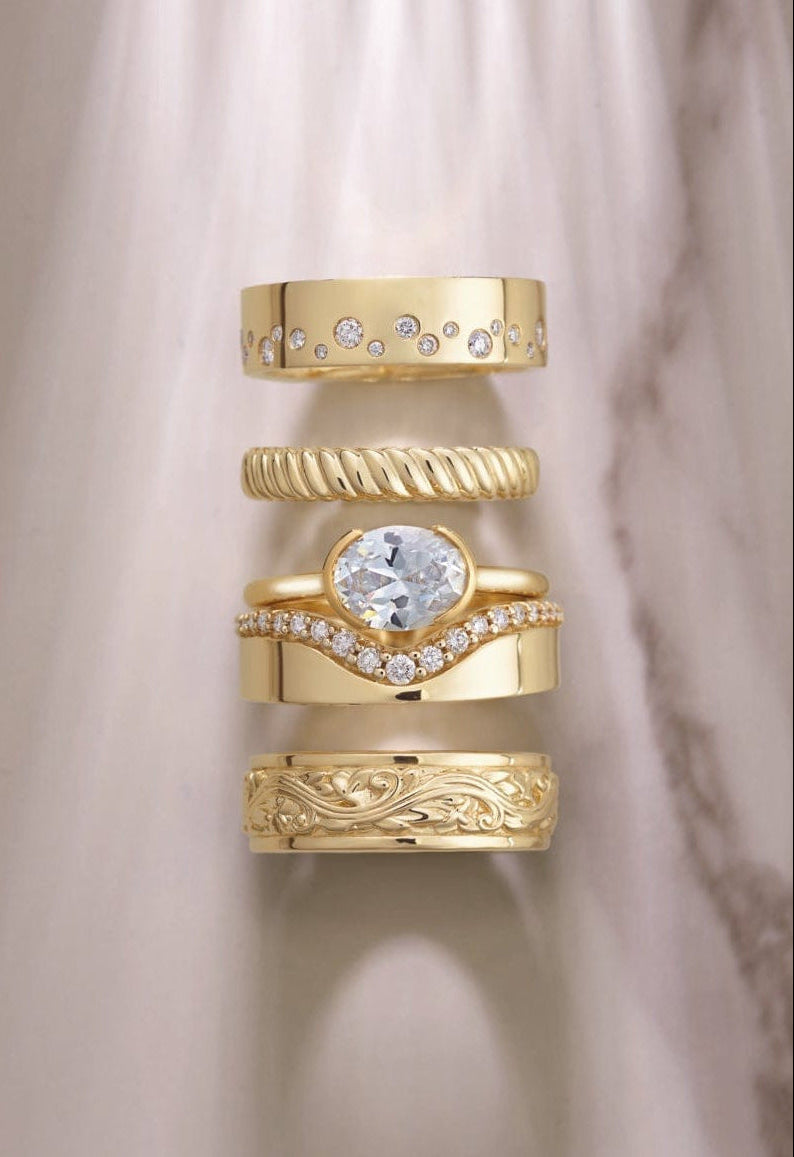 set of stackable gold wedding bands