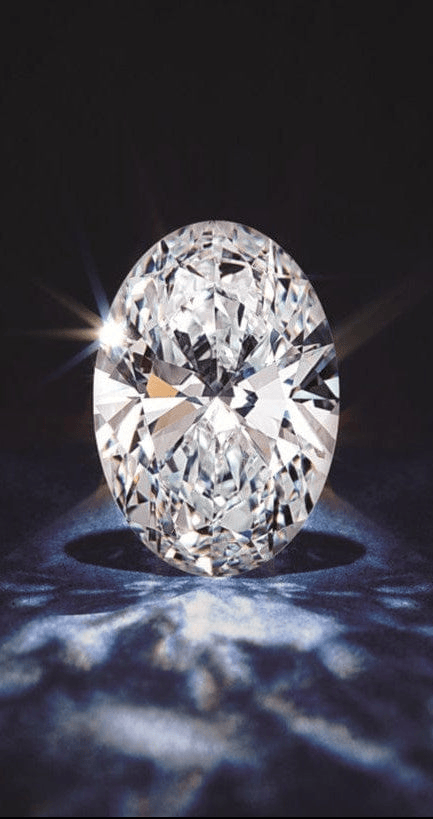 Oval-shaped  LAB GROWNdiamond on a dark background