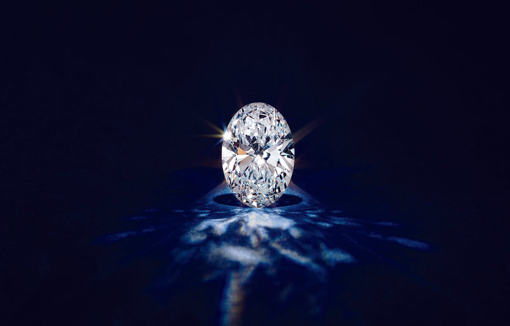 Single oval lab grown diamond on a black background