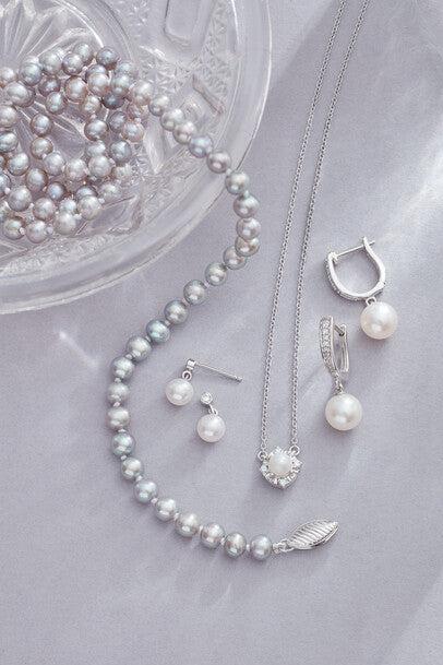 Various pearl jewelry items.