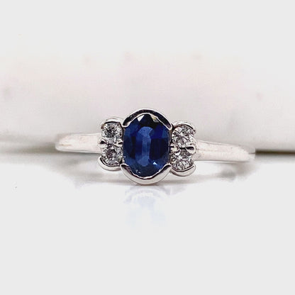 14K WHITE GOLD   .68 CT NATURAL  BLUE SAPPHIRE CENTER    .12 CT TW ROUND BRILLIANT NATURAL DIAMOND ACCENT   FASHION RING