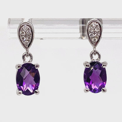 14K ROSE GOLD 1.70 CT TW AMETHYST CENTER 0.072 CT TW NATURAL DIAMOND ACCENT EARRINGS