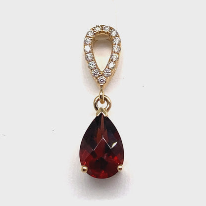 14K ROSE GOLD 1.85 CT GARNET CENTER 0.09 CT TW NATURAL DIAMOND ACCENT PENDANT